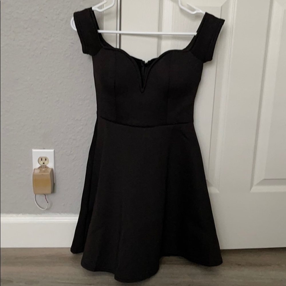 Flared black dress from Nasty Gal